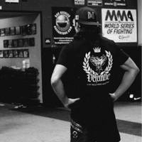 Robert  wearing a black t-shirt with Vehemence logo