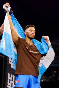 Michael Martinez holding his flag representing Honduras.