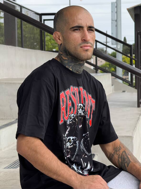 The Bulldog  wearing a Large RESILIENT tee