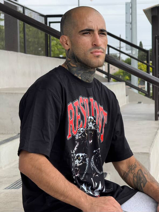 The Bulldog  wearing a Large RESILIENT tee